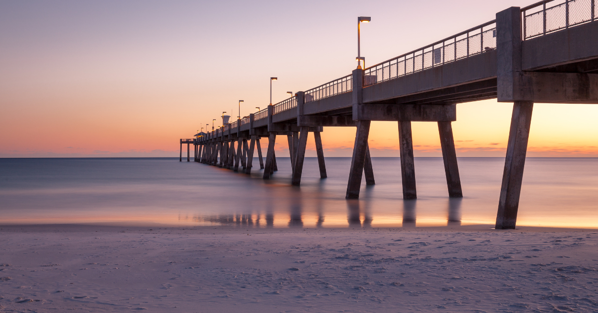 Pier in a quiet and empty beach